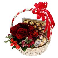 Order Rakhi Gifts to India 12 Red Roses, 40 Pcs Basket of Ferrero Rocher Chocolates