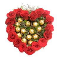 Rakhi and Chocolate Gifts to India with Heart Of 16 Pcs Ferrero Roacher N 18 Red Roses