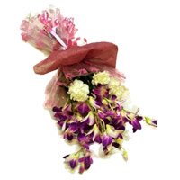 Rakhi with Orchid Flower Bouquet Delivery in India on Rakhi