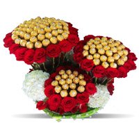 Send Online Rakhi with 96 Pcs Ferrero Rocher and 200 Red White Roses Bouquet