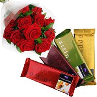 Online Rakhi Gift hamper Cadbury Temptation Bars with 12 Red Roses Bunch and Flowers with Rakhi to India